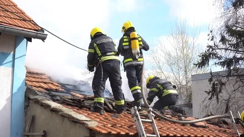 Firefighters in action 1 Video stock 104600317