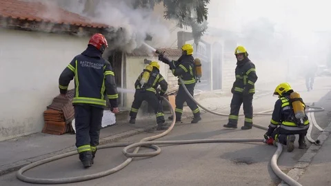 Firefighters in action 2 Video stock 104600290