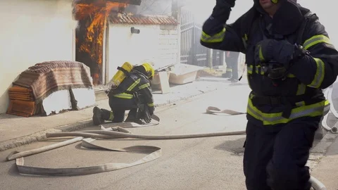 Firefighters in action 3 Video stock 104653562