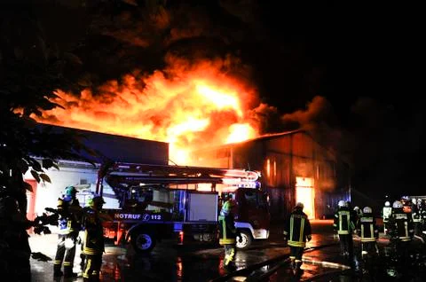 Firefighters in action Stock Photos