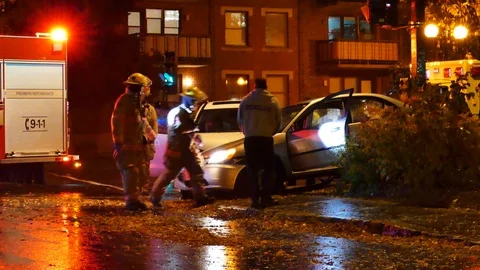 Firefighters analyzing car crash Stock Footage 120164822