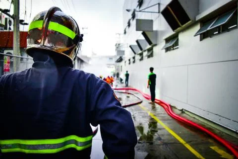 Firefighters are training firefighting methods for industrial workers Stock Photos