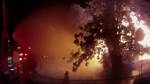 Firefighters Arrive at Burning Building Size Up Helmet Camera Video stock 244320839