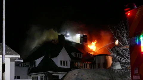 Firefighters battling school fire Stock Footage 139657198