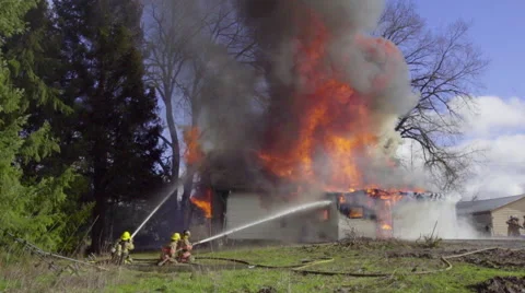 Firefighters can't stop huge flames Stock Footage 61170972