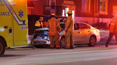 Firefighters at car crash Stock Footage 125314459