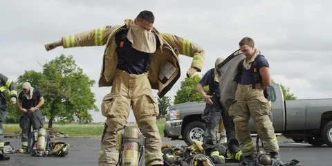 Firefighters Changing Stock Footage 123421055