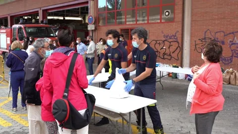 Firefighters collecting food and basic necessities for victims of poverty from 库存影片 132125821