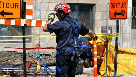 Firefighters at construction site Stock Footage 115935257