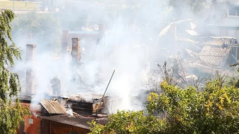 Firefighters continue to eliminate smoke Stock Footage 80021363