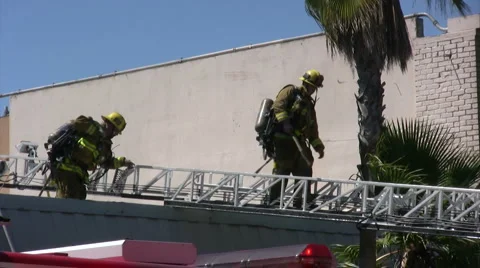 Firefighters descend ladder Video stock 5181614