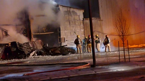 Firefighters destroying building Stock Footage 103627841