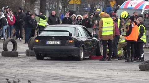 Firefighters doing tire fitting for a drift sport car Stock Footage 232009713