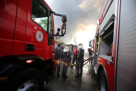 Firefighters during firefighting Stock Photos