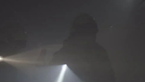 Firefighters During A Rescue Operation In A Dark Tunnel Filled With Smoke Stock Footage 266405958