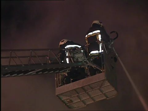 Firefighters on elevator Stock Footage 655457