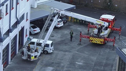 Firefighters exercise on a fire engine ladder Video stock 74012900