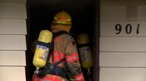 Firefighters Exit House Stock Footage 46970687