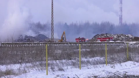 Firefighters extinguish a fire at the industrial site Video stock 101068563