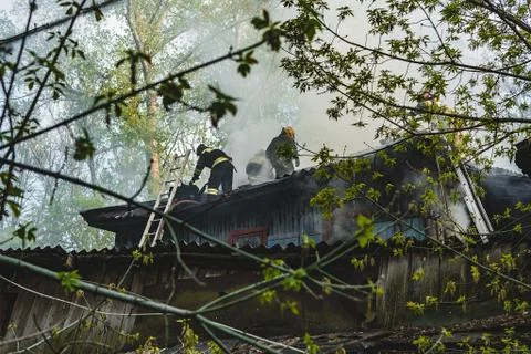 Firefighters extinguish the fire 写真素材