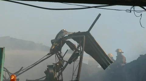 Firefighters fighting fire Stock Footage 549255