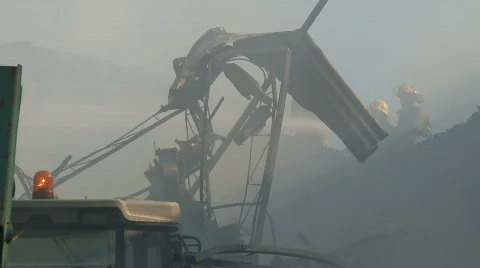 Firefighters fighting fire Stock Footage 567482