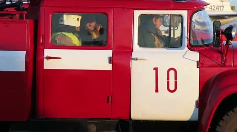 Firefighters in a fire engine. Close-up Stock Footage 54197769