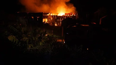 Firefighters Fire Engine At Facility Burning During Nighttime Slow Motion 4K 動画素材 91328708