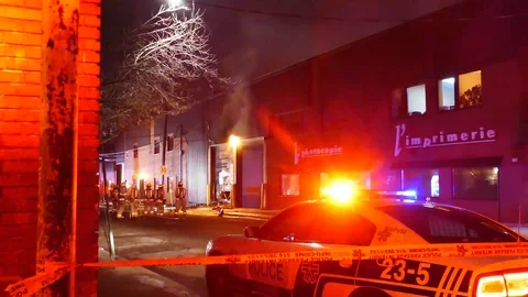 Firefighters at fire garage Stock Footage 102000909