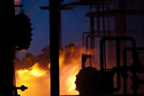 Firefighters in a fire Stock Photos