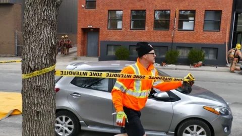 Firefighters with flashy vest making perimeter during fire Stock Footage 114946305