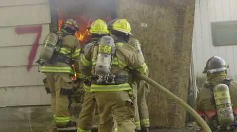 Firefighters get ready to put out fire Stock Footage 60737233