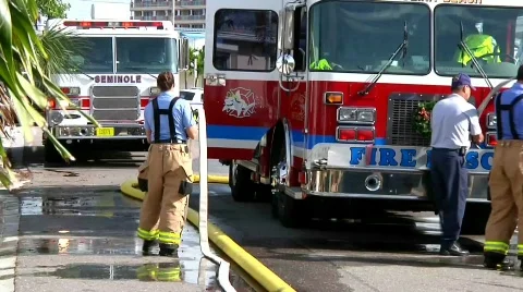 Firefighters with hose 2 Stock Footage 688264
