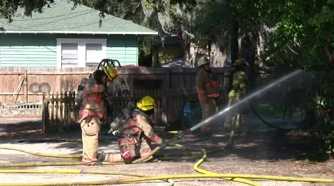 Firefighters with hose Stock Footage 689438