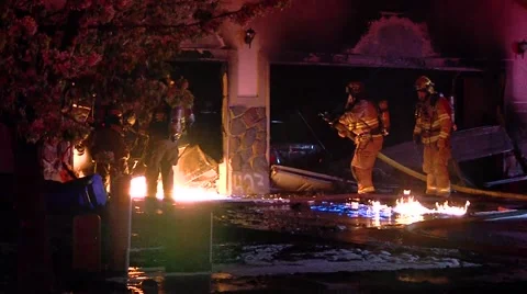 Firefighters at house fire Stock Footage 45504501