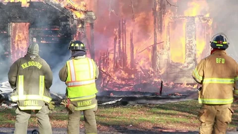 Firefighters At House Fire Video stock 73897181