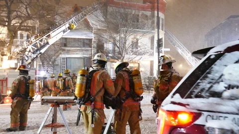 Firefighters intervention during snowstorm Stock Footage 125420063