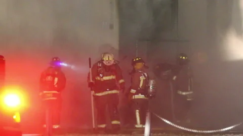 Firefighters leaving Building Stock-Footage 45653401