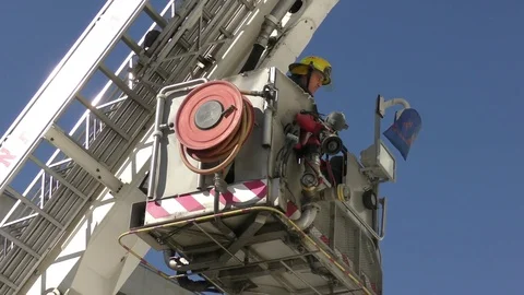 Firefighters operate a crane ladder 스톡 동영상 72009478