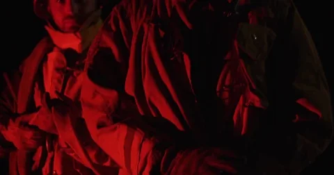 Firefighters plan their next move during an emergency. Stock Footage 69215907