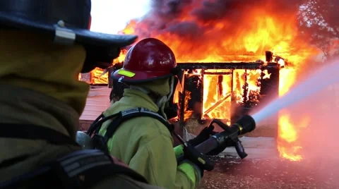 Firefighters protecting exposers Video stock 57094596