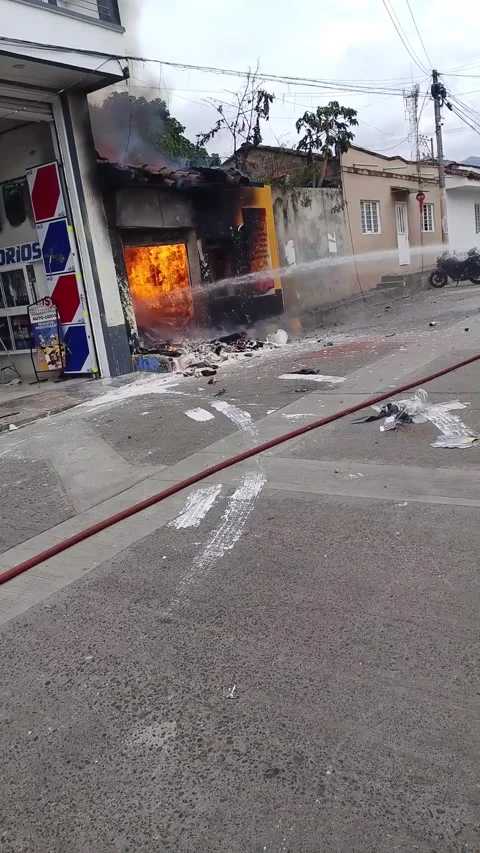 Firefighters Put Out Fire at Paint Business in Colombia, La Union, Valle del Cau Stock Footage 340276843