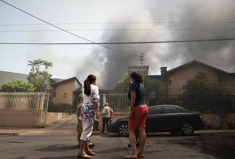Firefighters put out fire in a textile factory in Paraguay, Asuncion - 19 Jan 20 Stock Photos