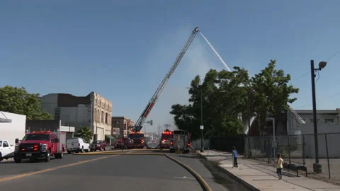 Firefighters Putting Out Large Fire - Stockton, CA Stock Footage 189641495