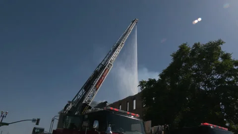 Firefighters Putting Out Large Fire - Stockton, CA Stock Footage 189646837