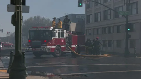 Firefighters Putting Out Large Fire - Stockton, CA Stock Footage 189648860