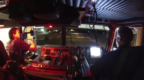 Firefighters Ready for Action: Camera in Cab Stock Footage 46499956