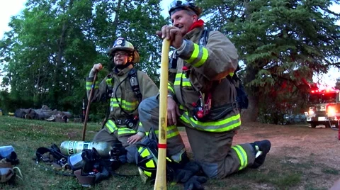 Firefighters at the ready Stock Footage 58565318