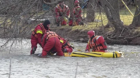 Firefighters Remove Body From River Stock Footage 60633569