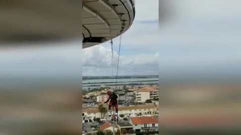 Firefighters Remove Lighthouse Cladding Endangering Public Road in Herault,... Stock Footage 277196682